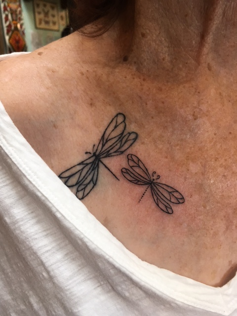 author's tattoo of two dragonflies
